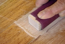 sanding with a block and fine sandpaper